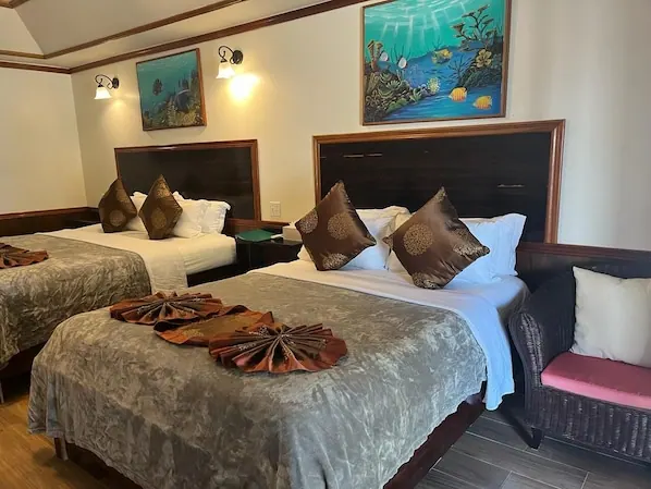 Guest room in the Captain Morgan’s Retreat photo gallery
