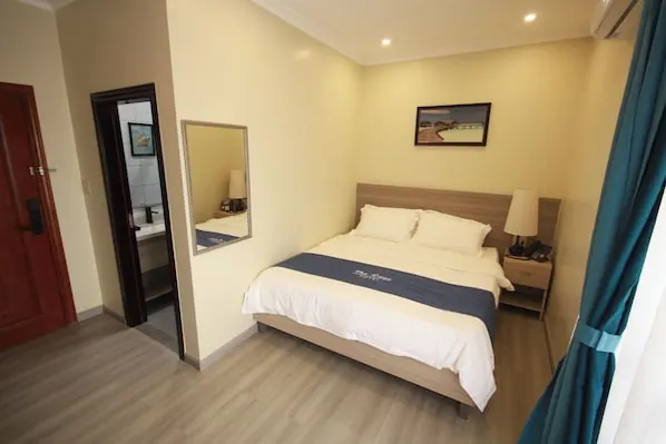 Guest room in the The Caye Hotel — San Pedro photo gallery