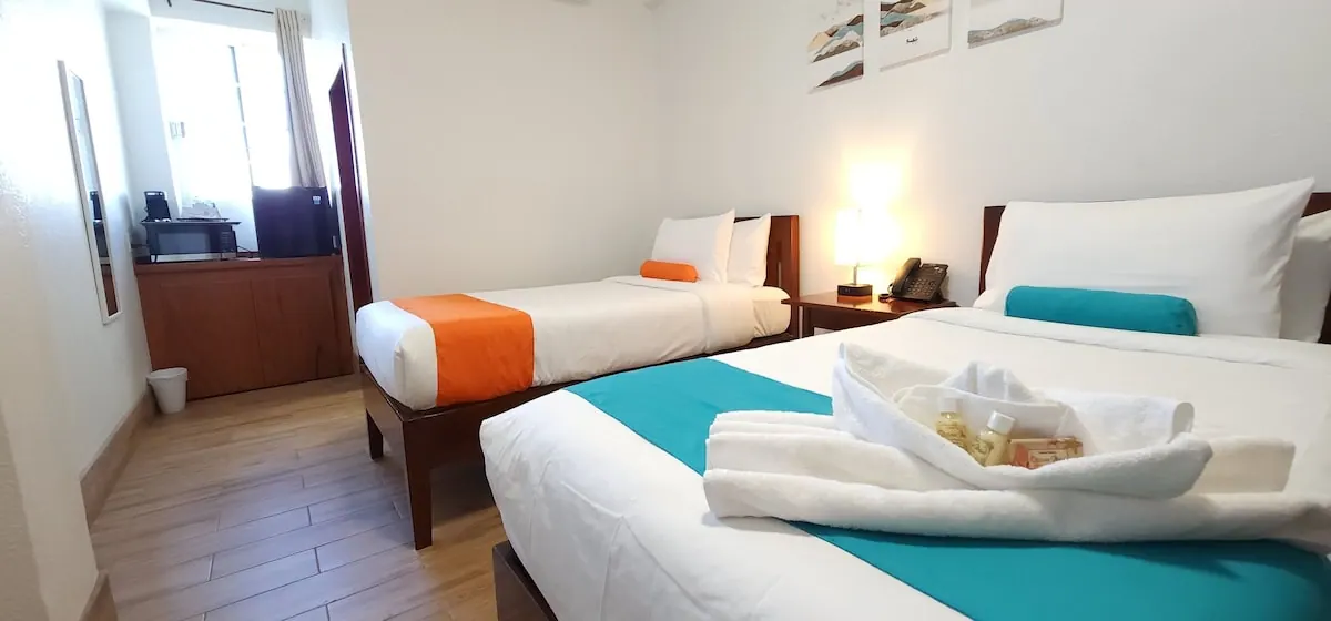 Guest room in the Voyager Sun & Reef Hotel photo gallery